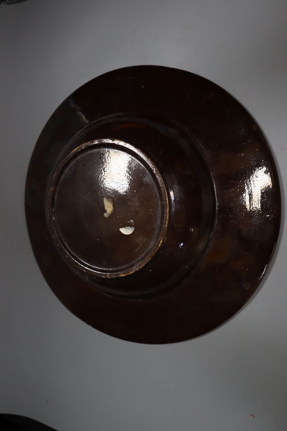 A Swiss Thoune peasant pottery dish, 37cm